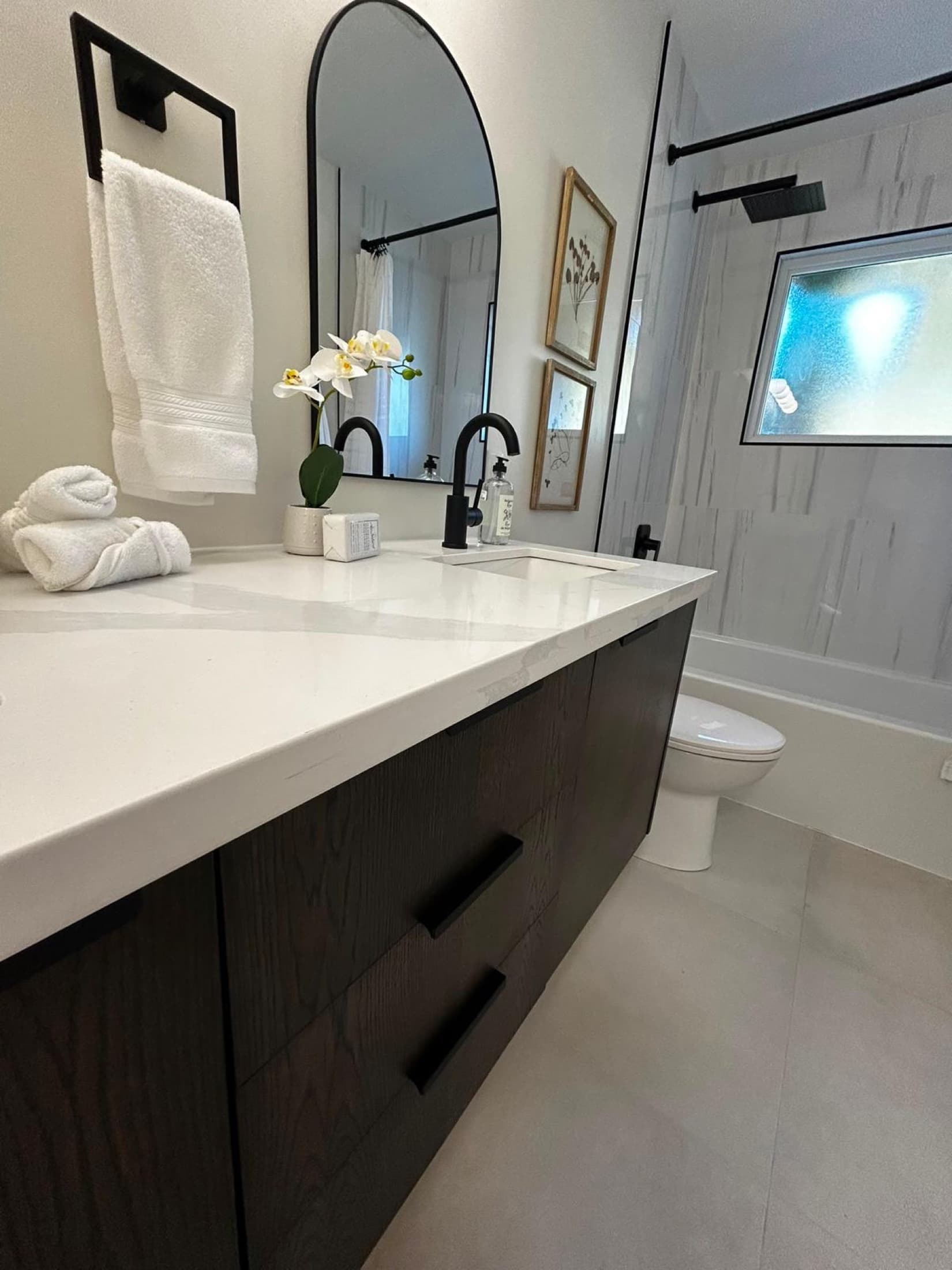 Custom double vanity with matte black fixtures